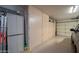 Organized garage with built-in storage cabinets and ample space for vehicles at 16527 W Blackhawk Ct, Surprise, AZ 85374