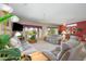 Large living room featuring recliners, neutral color schemes, and bright light at 16527 W Blackhawk Ct, Surprise, AZ 85374