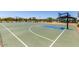 Well-maintained community basketball court with playground in the background, perfect for recreation at 17419 W Via De Luna Dr, Surprise, AZ 85387