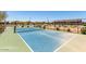 A community pickleball court in a landscaped community, ready for friendly matches at 17419 W Via De Luna Dr, Surprise, AZ 85387