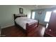 Cozy bedroom with hardwood floors, and plenty of natural light creating a comfortable retreat at 17463 N Del Webb Blvd, Sun City, AZ 85373