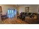 Comfortable living area with hardwood floors and plush seating, ideal for relaxation and socializing at 17463 N Del Webb Blvd, Sun City, AZ 85373