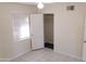 Clean bedroom with tile flooring and window letting in natural light at 1914 W Colter St, Phoenix, AZ 85015