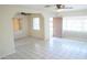 Spacious living room with tile flooring, windows with sunlight and open floor plan at 1914 W Colter St, Phoenix, AZ 85015