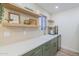 Charming kitchen with modern countertops, trendy cabinets, and open shelving for a stylish, functional space at 1942 S Emerson -- # 211, Mesa, AZ 85210