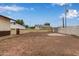 Large dirt backyard with block wall and fence at 2022 E Mulberry Dr, Phoenix, AZ 85016