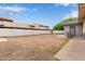 Large dirt backyard with a block wall at 2022 E Mulberry Dr, Phoenix, AZ 85016