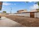 This home features a fully enclosed backyard with privacy walls and wooden entry gate at 2022 E Mulberry Dr, Phoenix, AZ 85016