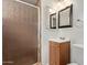 Bathroom with a walk-in shower, vanity, and square mirrors for a sleek, updated look at 2022 E Mulberry Dr, Phoenix, AZ 85016