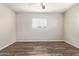 Bright bedroom with modern flooring, fresh paint, and ample natural light at 2022 E Mulberry Dr, Phoenix, AZ 85016