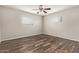 Inviting bedroom with wood-look floors and plenty of natural light, creating a cozy retreat at 2022 E Mulberry Dr, Phoenix, AZ 85016
