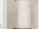 Walk-in closet that maximizes storage with shelves, and a clean white interior at 2022 E Mulberry Dr, Phoenix, AZ 85016