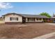 Traditional single-story home showcasing a covered parking spot and a well-maintained front exterior at 2022 E Mulberry Dr, Phoenix, AZ 85016