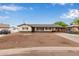 Charming single-story home featuring a covered carport and a neutral color scheme with brown accents at 2022 E Mulberry Dr, Phoenix, AZ 85016