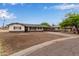 Exterior of single-story home featuring a convenient carport and easy street access at 2022 E Mulberry Dr, Phoenix, AZ 85016