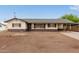 Traditional single-story home showcasing a covered parking spot and a well-maintained front exterior at 2022 E Mulberry Dr, Phoenix, AZ 85016