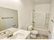 Bright bathroom with a tub, shower and a stylish quartz countertop at 20427 W Mountain Sage Dr, Buckeye, AZ 85326