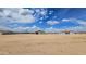 New construction homes in a developing community with a clear blue sky and scenic views at 20427 W Mountain Sage Dr, Buckeye, AZ 85326