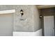 Charming home exterior showcases address, garage, front door, and decorative lighting at 20427 W Mountain Sage Dr, Buckeye, AZ 85326