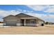 This move-in ready house has a garage and desert landscaping at 20427 W Mountain Sage Dr, Buckeye, AZ 85326