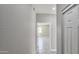 Hallway featuring tile floors leading to bedrooms at 20427 W Mountain Sage Dr, Buckeye, AZ 85326