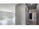 Open living area with tile floors and views from several windows at 20427 W Mountain Sage Dr, Buckeye, AZ 85326