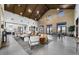 Spacious clubhouse lounge area with high ceilings, stylish furnishings, and ample seating for residents to gather at 20486 E Via Del Jardin --, Queen Creek, AZ 85142
