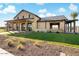 Exterior view of the community building featuring modern architecture, landscaping, and inviting outdoor spaces at 20486 E Via Del Jardin --, Queen Creek, AZ 85142