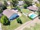 Expansive property featuring a lush green lawn, a sparkling pool, and ample space for outdoor activities at 2331 E Melrose St, Gilbert, AZ 85297