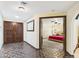 Spacious entryway featuring double doors, decorative tile flooring, and an open view to the bedroom at 2331 E Melrose St, Gilbert, AZ 85297