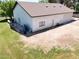 View of exterior and detached garage with concrete and grass landscaping at 2331 E Melrose St, Gilbert, AZ 85297