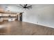 Spacious kitchen features white cabinets, a large island, and stainless steel appliances for a modern aesthetic at 23420 N 121St Ave, Sun City, AZ 85373