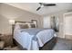 Comfortable bedroom with a ceiling fan and a neutral color palette at 2727 W Libby St, Phoenix, AZ 85053