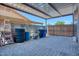 Covered garage with ladder and supplies for storage at 2727 W Libby St, Phoenix, AZ 85053