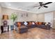 Inviting living room boasts a comfortable sectional sofa and natural light, perfect for relaxing and entertaining at 2727 W Libby St, Phoenix, AZ 85053