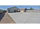 Nice backyard features a concrete patio, shed, and ample space for entertaining at 30935 W Mulberry Dr, Buckeye, AZ 85396