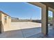 Spacious backyard features a concrete patio and shed, perfect for entertaining and storage at 30935 W Mulberry Dr, Buckeye, AZ 85396