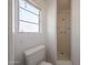 Functional bathroom showing a walk-in shower and bright window at 3317 N 10Th Ave, Phoenix, AZ 85013