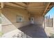 Covered carport with brick and wood paneling offers protection from the elements at 3317 N 10Th Ave, Phoenix, AZ 85013