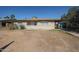 Single story brick house with desert landscaping and attached carport at 3317 N 10Th Ave, Phoenix, AZ 85013
