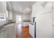 Bright kitchen features white cabinets, laminate countertops, and modern appliances at 3317 N 10Th Ave, Phoenix, AZ 85013