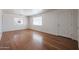 Inviting living room featuring hardwood floors and multiple windows at 3317 N 10Th Ave, Phoenix, AZ 85013
