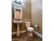 Traditional half bathroom with pedestal sink, toilet, and neutral paint at 3840 E San Mateo Way, Chandler, AZ 85249
