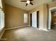 Inviting bedroom featuring neutral carpet, window shutters, and a spacious closet at 3840 E San Mateo Way, Chandler, AZ 85249