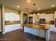 Gourmet kitchen features granite countertops, stainless appliances, and ample storage space at 3840 E San Mateo Way, Chandler, AZ 85249