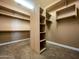 Large walk-in closet with shelving and ample storage space at 3840 E San Mateo Way, Chandler, AZ 85249