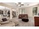 Inviting living room showcases open floor plan, plush carpet, and comfortable seating area at 4254 S Winter Ln, Gilbert, AZ 85297