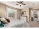 Comfortable main bedroom with a large window and dresser at 4254 S Winter Ln, Gilbert, AZ 85297