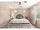 Relaxing main bedroom boasts neutral walls, carpeted floor, and a king bed with stylish headboard at 4254 S Winter Ln, Gilbert, AZ 85297