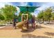 Colorful playground with multiple slides is a great space for to play and socialize at 4254 S Winter Ln, Gilbert, AZ 85297